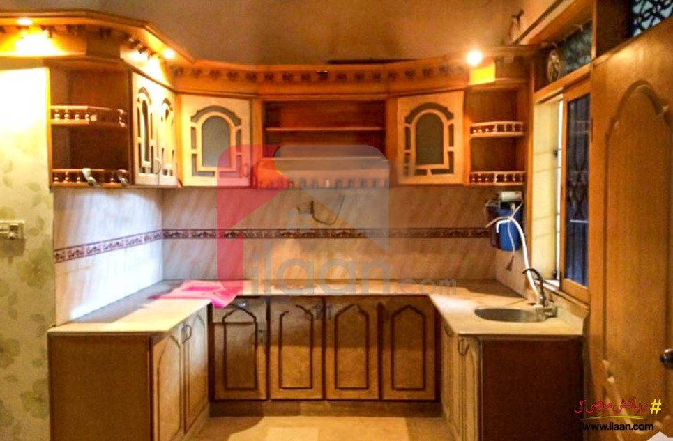 240 ( square yard ) house for sale ( with 2 shops ) on Abul Hassan Isphani Road, Karachi