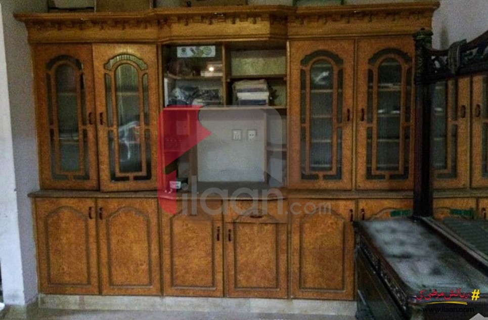 240 ( square yard ) house for sale ( with 2 shops ) on Abul Hassan Isphani Road, Karachi